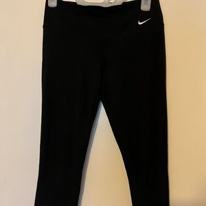 Women’s small black Nike leggings. Upper to mid calf length.